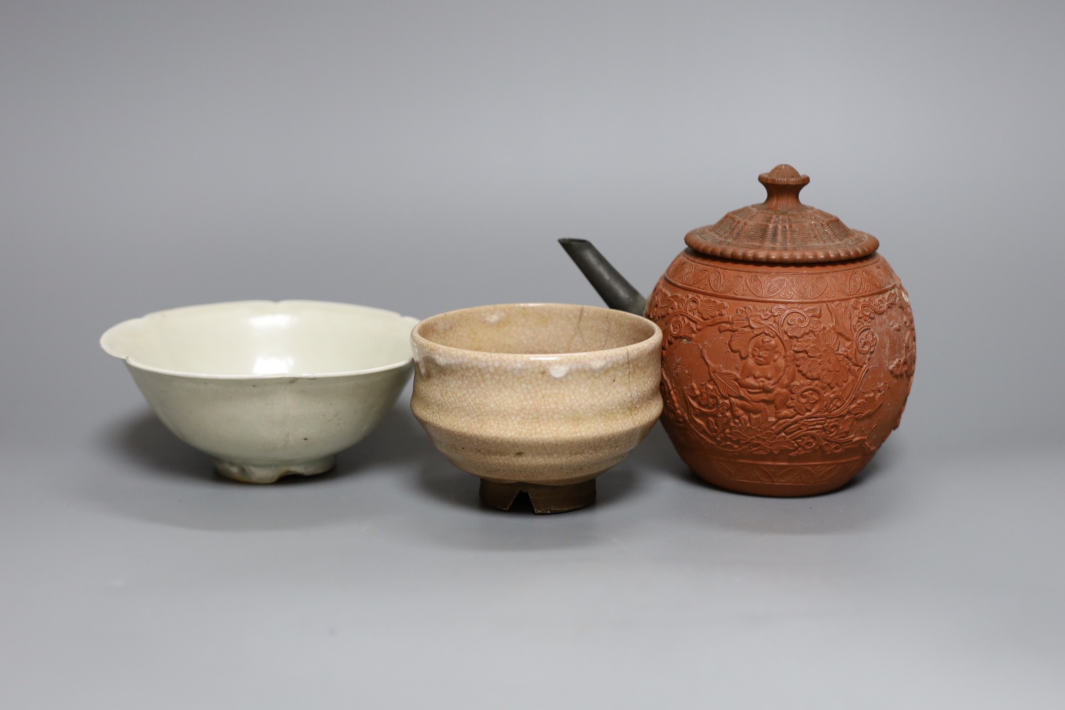 A Chinese Yixing teapot, 12cm tall, and two other Chinese ceramic bowls